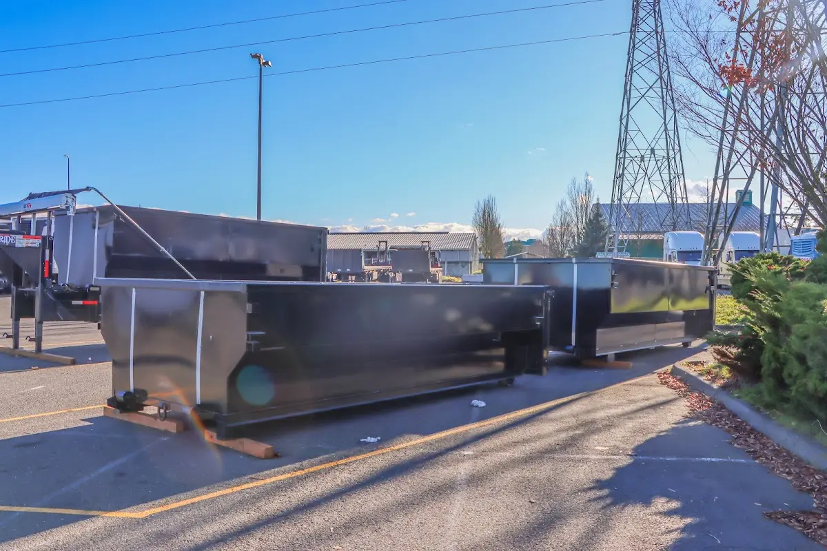 Roll-off dumpster ready for waste disposal at job site for 2 Yard Dumpster Rental in La Vergne